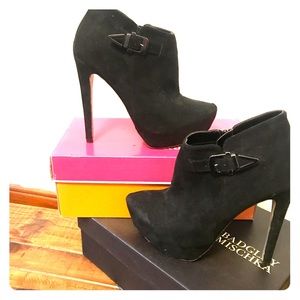 Platform black high heeled booties